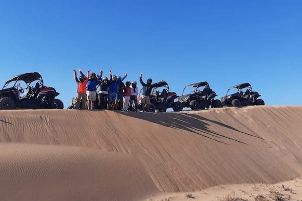 Buggy crossing open pre-Saharan terrain