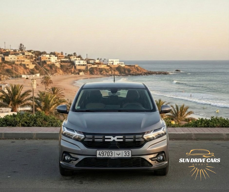 Sun Drive Cars grey Dacia Logan with the gold Sun Drive Cars Agadir logo