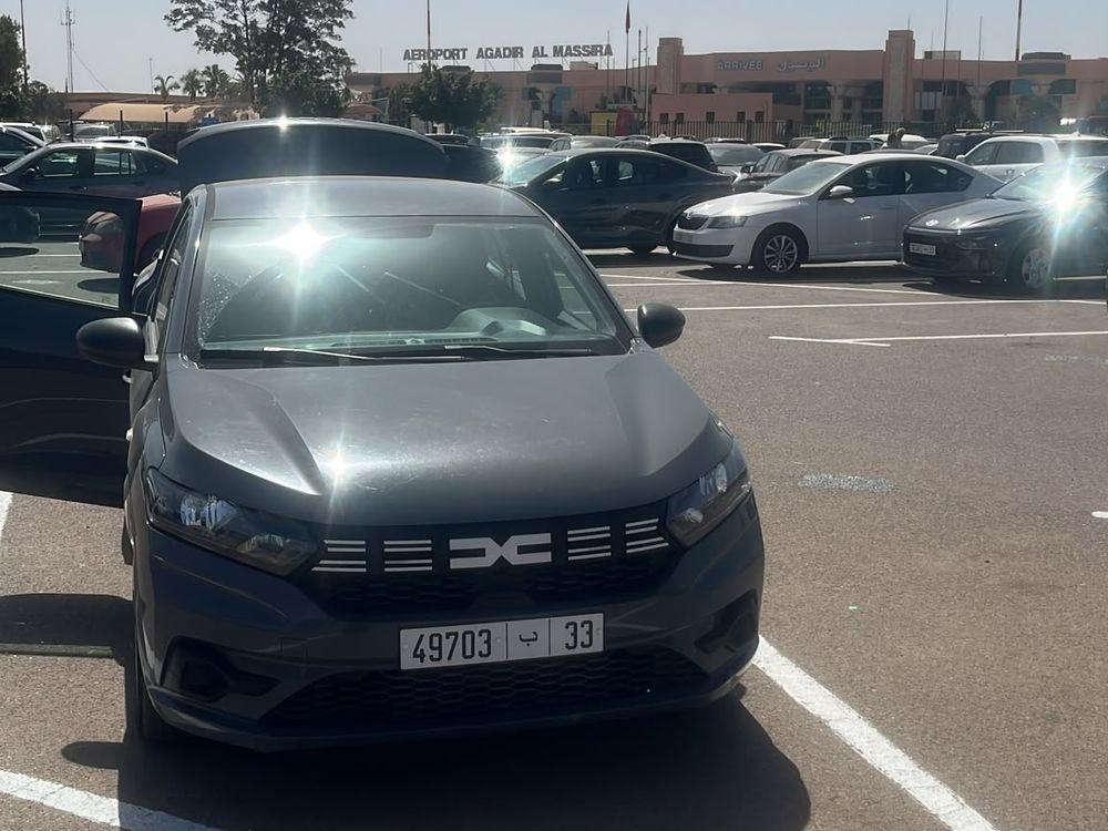 Grey Dacia Logan sedan parked at Agadir Al Massira Airport